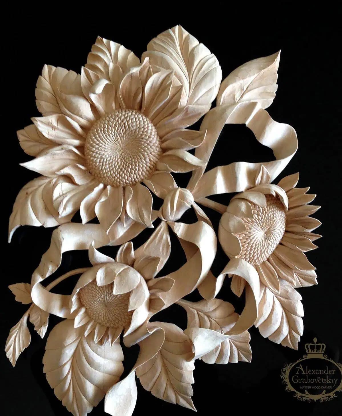 Carved Sunflower Relief Panel Deep-relief sunflower panel hand-carved in limewood by Alexander Grabovetskiy, an ornamental custom wood carving.