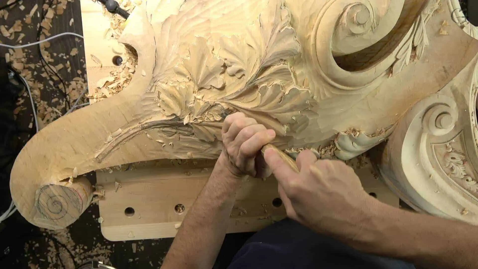 Carved Venetian Architectural Corbel by Alexander Grabovetskiy Alexander Grabovetskiy shaping acanthus leaves and volutes on a capital in this custom wood carving.