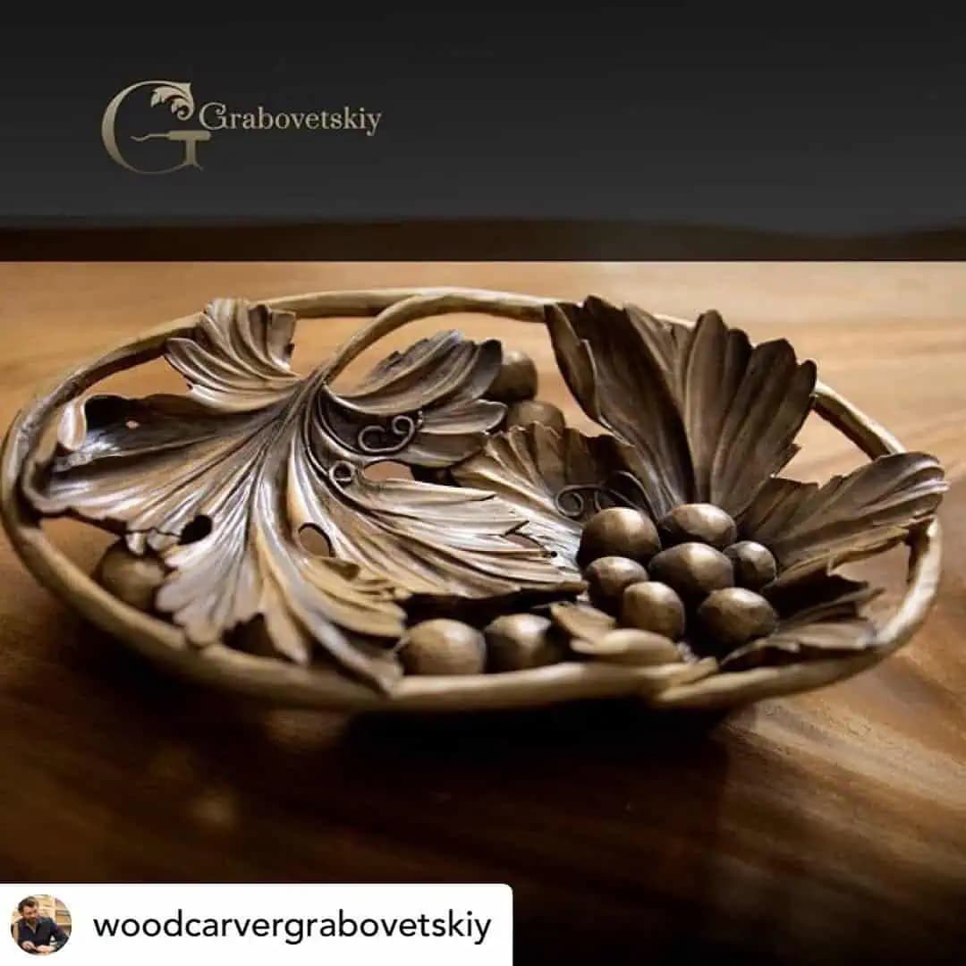 Carved Grape and Vine Leaf Bowl Limewood bowl with carved grapes and vine leaves, a custom wood carving by Alexander Grabovetskiy.