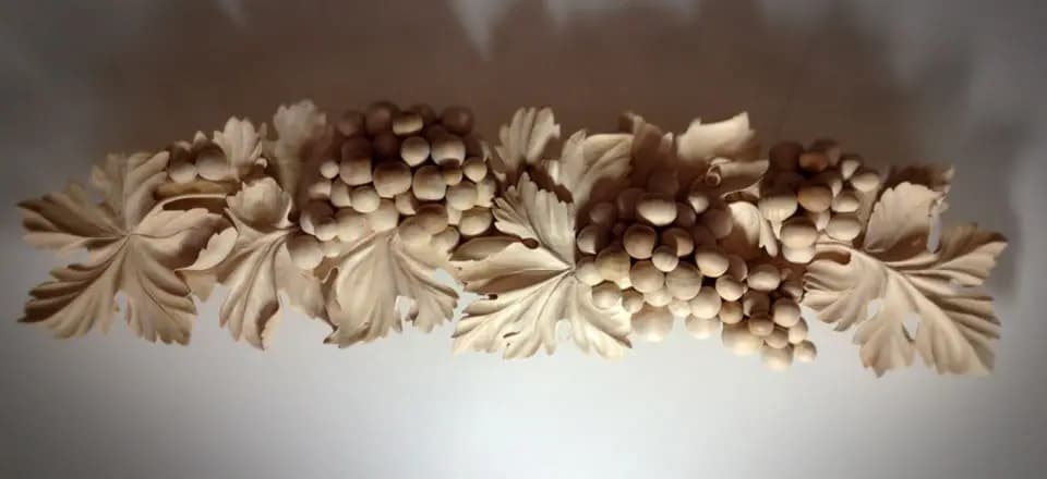 Carved Grape Cluster and Vine Leaf Frieze Limewood grape clusters and vine leaves hand-carved in high relief by Alexander Grabovetskiy, a custom wood carving.