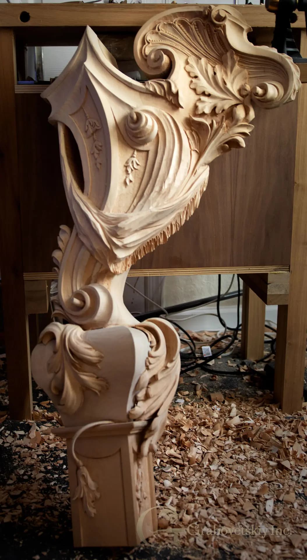 Carved Rococo Cartouche Stair Newel Post Rococo scrollwork and acanthus newel post by Alexander Grabovetskiy, a custom wood carving in limewood.